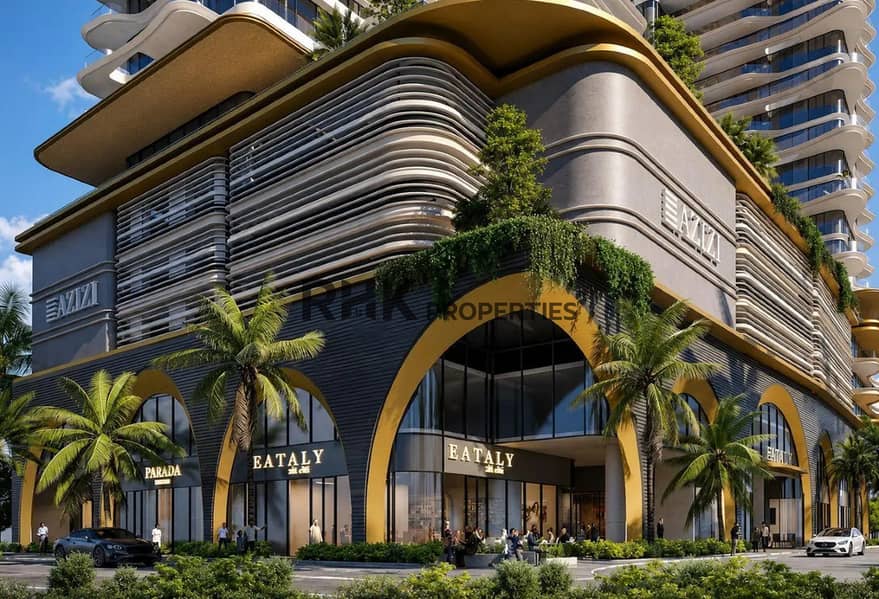 9 Azizi mixed-use development retail podium with Eataly and luxury brand stores gold arch facade Dubai