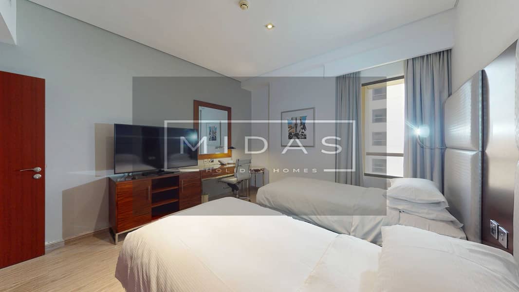 11 MIDAS-REAL-ESTATE-Hilton-The-Walk-1612-02262026_123231. jpg