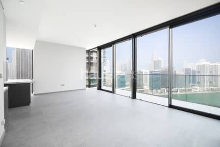 3 Bedroom Apartment for Sale in Business Bay, Dubai - Exclusive | Burj Khalifa & Canal View | Ready