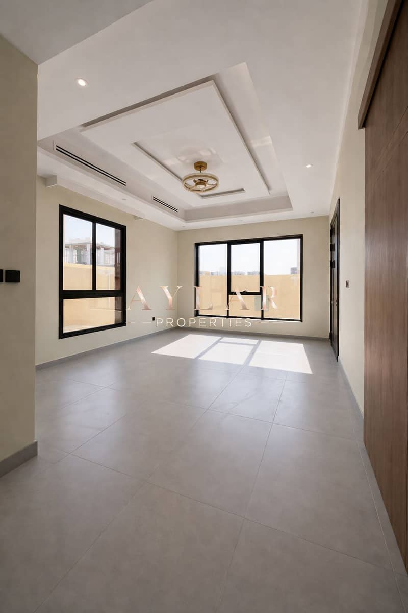 11 Elegant living room with tray ceiling. png