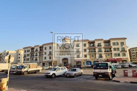 محل تجاري  للايجار في المدينة العالمية، دبي - greece-cluster-23905_xl. jpg