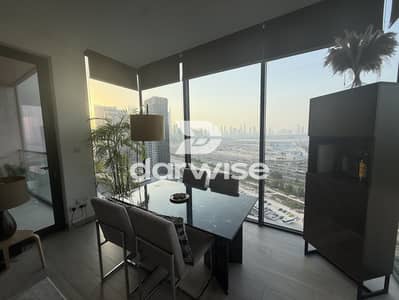 2 Camere Appartamento in vendita a Sobha Hartland, Dubai - sobha-hartland-01-corner-living-dining-skyline-dusk. jpg