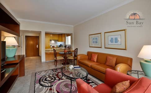 1 Slaapkamer Hotel Apartment te Huur in Deira, Dubai - 1BR - Living Room. jpg