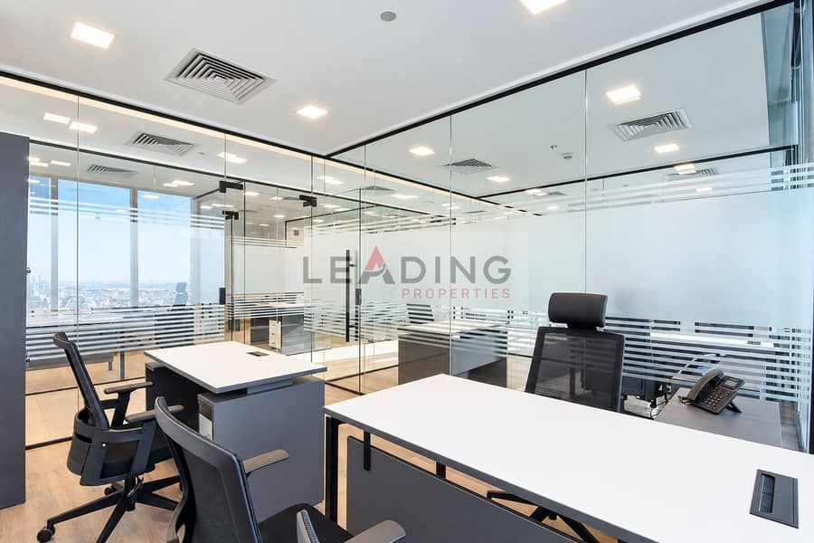 4 Pristine glass-enclosed executive office. png