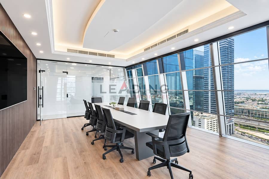 9 Pristine executive boardroom with angled windows. png