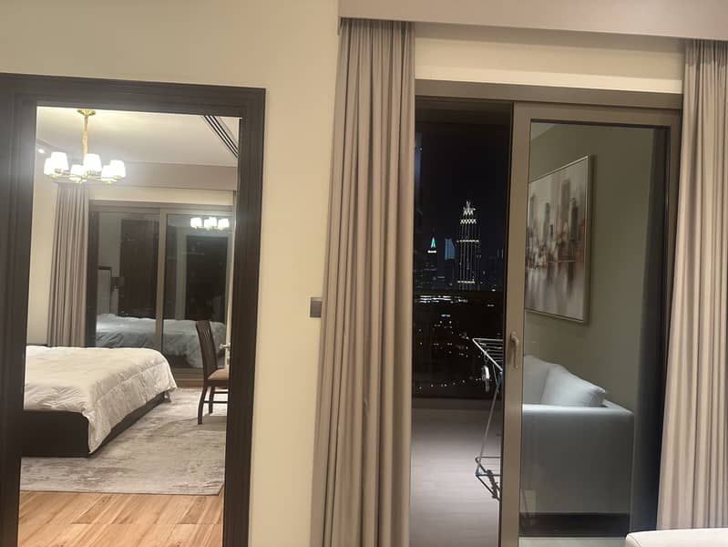 11 1319 Elite Downtown R1 Living Room Balcony Bedroom. jpeg