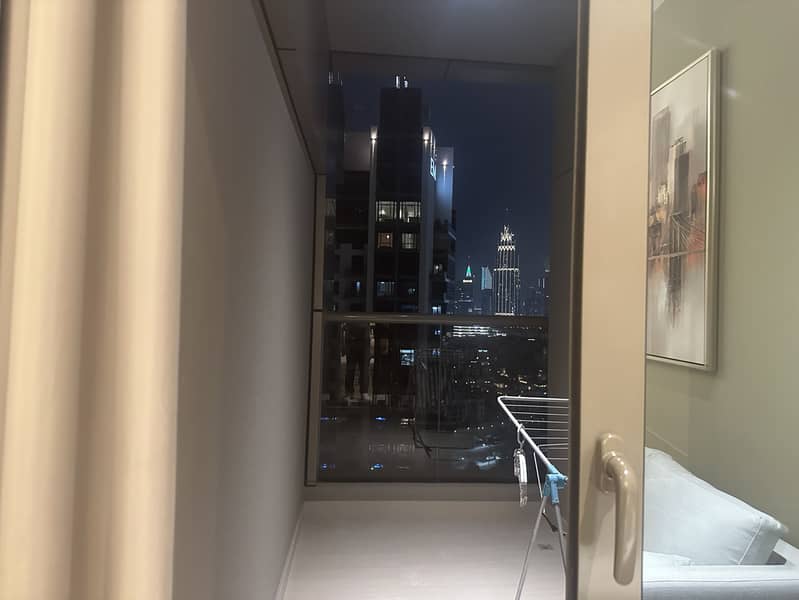 14 1319 Elite Downtown R1 Living Room Balcony. jpeg
