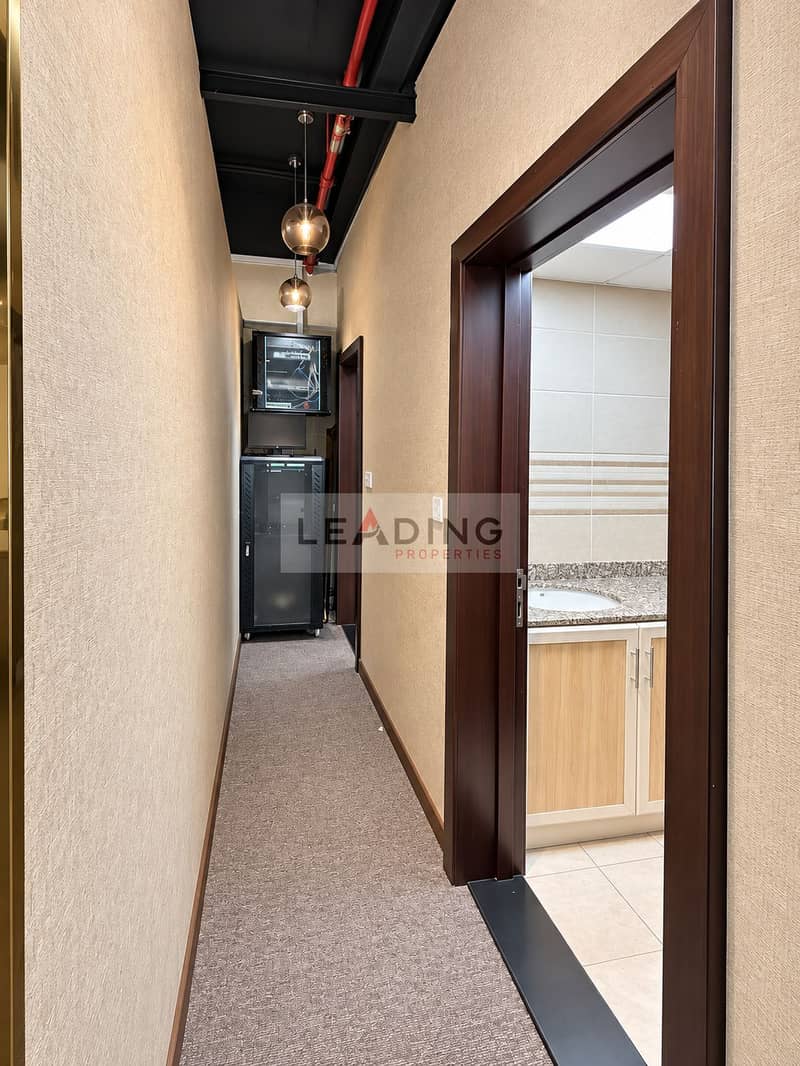 11 Refined Narrow Corridor With Warm Pendants. png