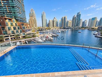 迪拜码头， 迪拜 1 卧室单位待租 - Luxury pool overlooking the marina skyline. png