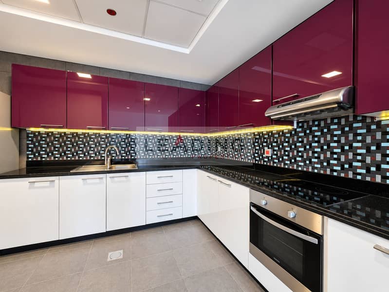 6 Immaculate Burgundy L-Shaped Kitchen. png