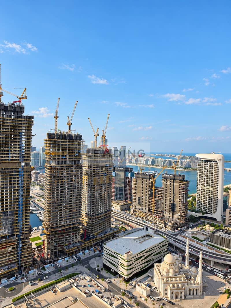 14 Polished Cityscape with Mosque and Cranes. png
