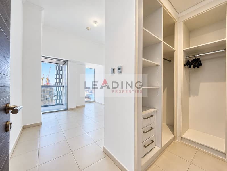 15 Refined modern interior with open wardrobe. png