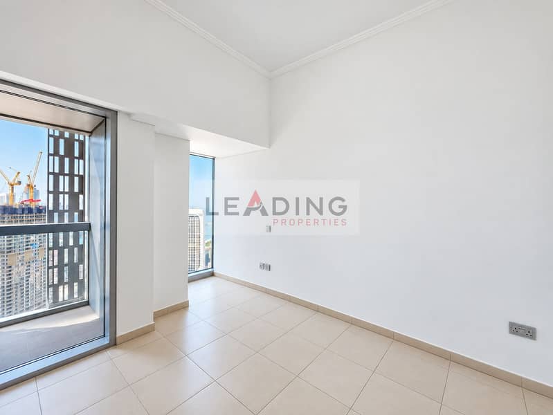 17 Bright Pristine Interior with Urban Balcony View. png