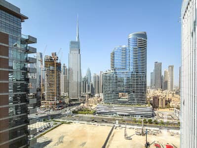 Office for Rent in Business Bay, Dubai - Burj Khalifa - Canal View | Vacant | 2 Parking