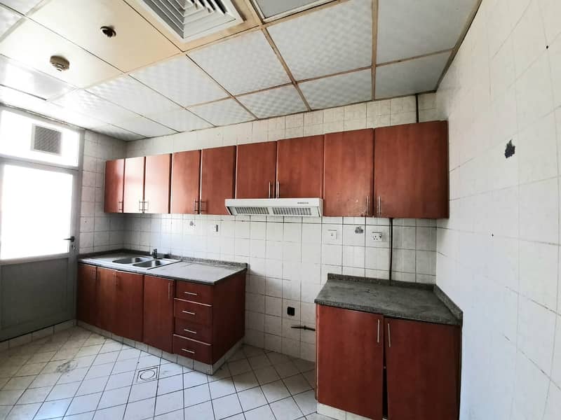 Spacious  2BR , with Master Bed , Big Size Kitchen , Balcony in Al Nahda - 2
