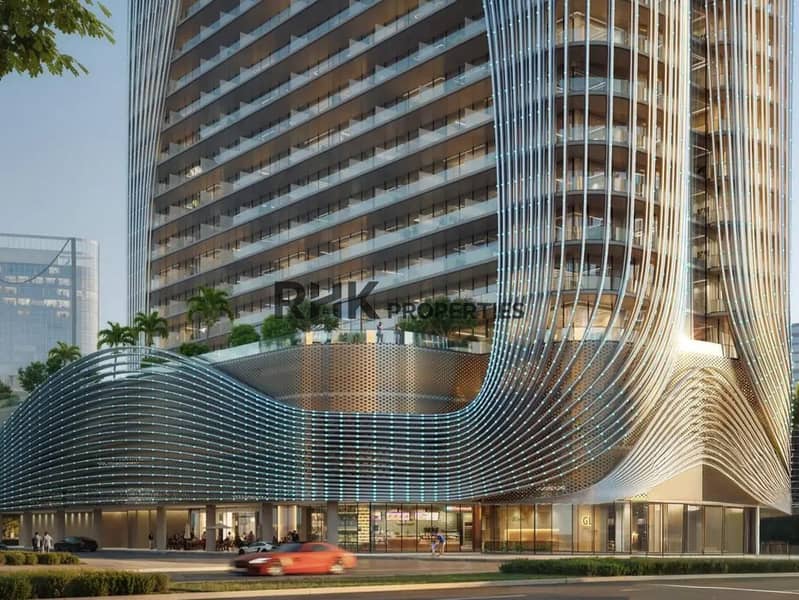 14 Architectural close-up of luxury tower podium with sculptural wave-ribbon glass and steel facade cladding, rooftop terrace and retail frontage in Dubai