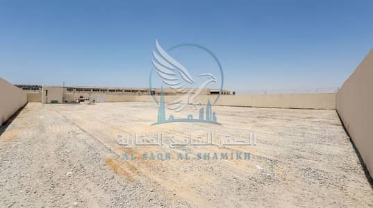 Mixed Use Land in affitto a Industrial Area, Sharjah - حوطة بمساحة كبيرة وأرضية أسفلت مناسبة للتخزين والاستخدام التجاري. . jpeg Mixed Use Land in affitto a Industrial Area, Sharjah - حوطة بمساحة كبيرة وأرضية أسفلت مناسبة للتخزين والاستخدام التجاري. . jpeg