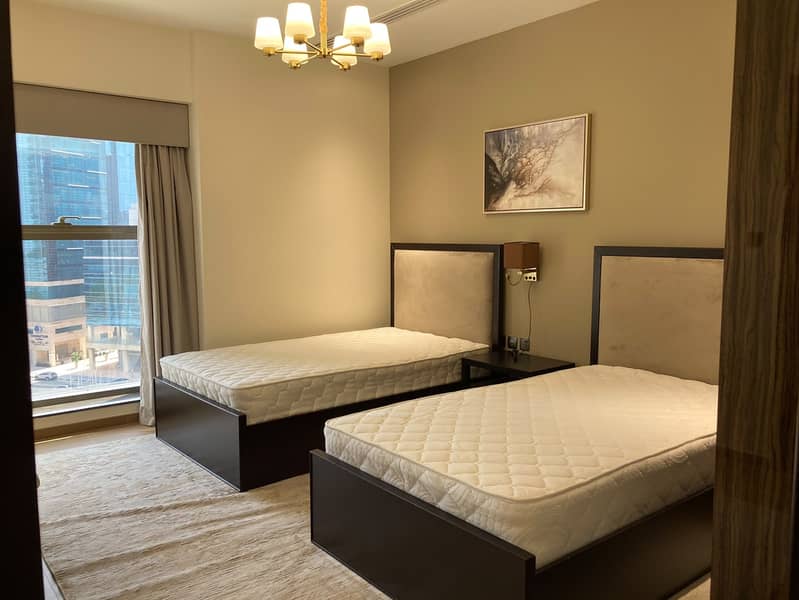 9 204 Elite Downtown Residence Twin Bedroom 2. jpeg