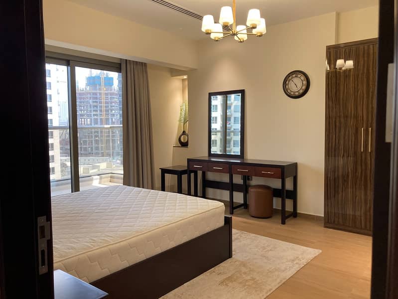 15 204 Elite Downtown Residence King Bedroom 1. jpeg