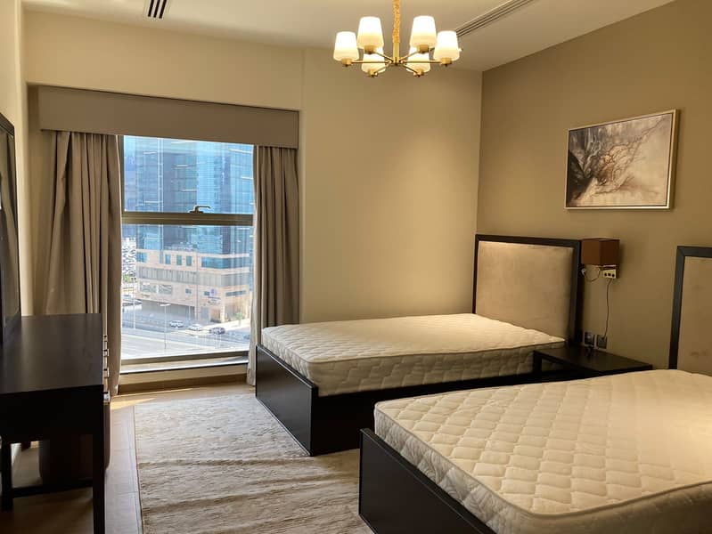 20 204 Elite Downtown Residence Twin Bedroom 3. jpeg