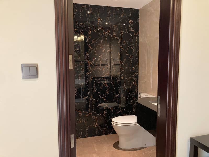 28 204 Elite Downtown Residence Guest Bathroom. jpeg