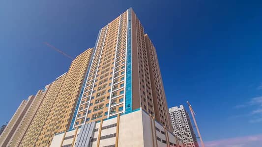 2 Schlafzimmer Wohnung zum Verkauf in Emirates City, Ajman - rrr. webp