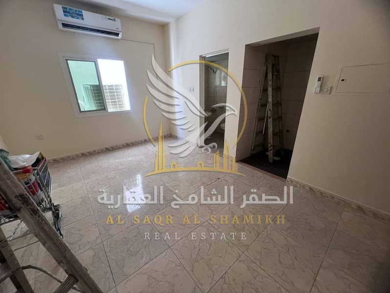 3 استوديو-للا-يجار-0-غرف-النباعة-الشارقة-صالة-re-0001-03. jpg