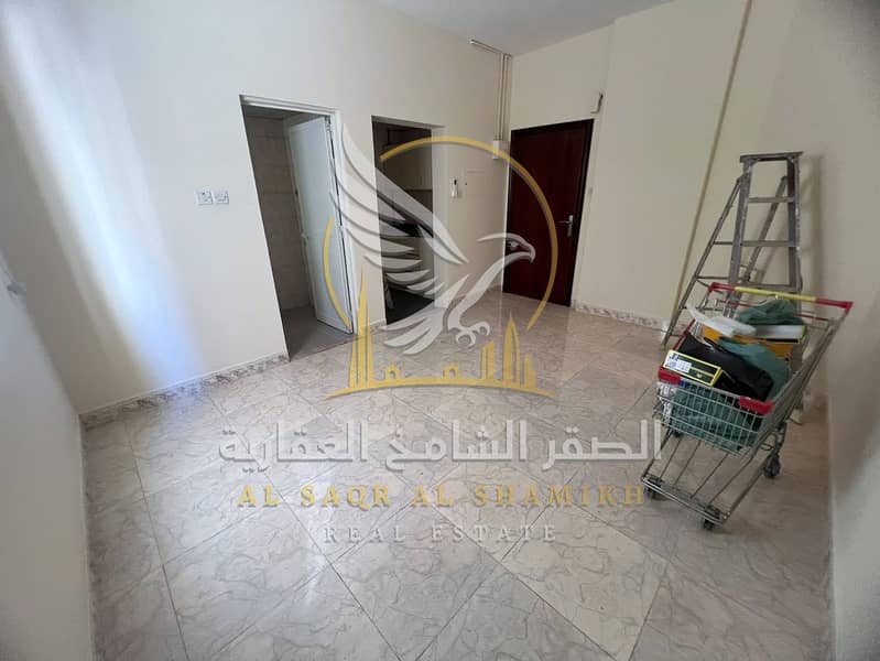 4 استوديو-للا-يجار-0-غرف-النباعة-الشارقة-صالة-re-0001-04. jpg