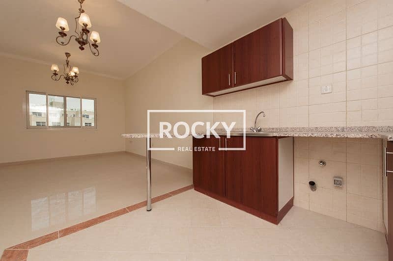 7 InternationalCity_Phase2_AlHashmi_313-1BR-WOB-11. jpg
