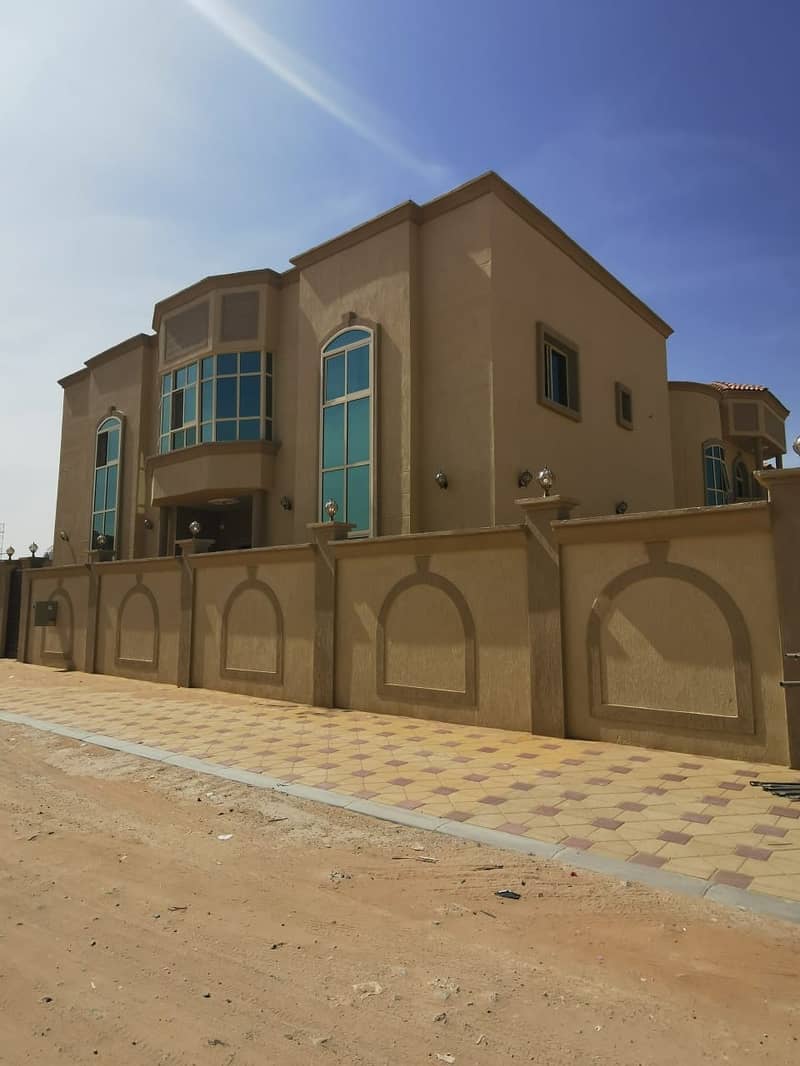 Villa for sale, corner of two streets, next to Sheikh Mohammed Bin Zayed Road