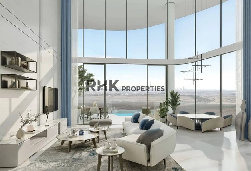 2 luxury apartment Dubai double height living room floor to ceiling windows city skyline view
