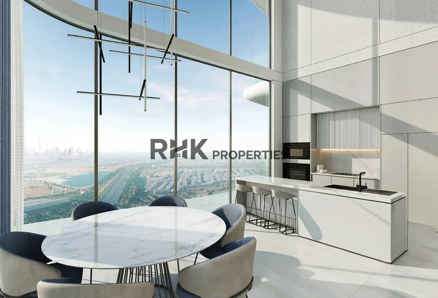 3 luxury apartment Dubai open plan kitchen marble island panoramic skyline view