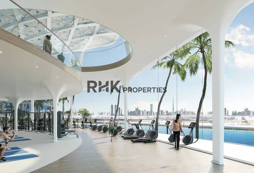 10 luxury residential gym Dubai skyline view glass ceiling infinity pool wellness amenities