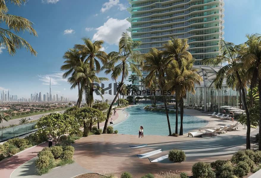 12 resort style pool Dubai luxury apartments palm trees Burj Khalifa view sun loungers