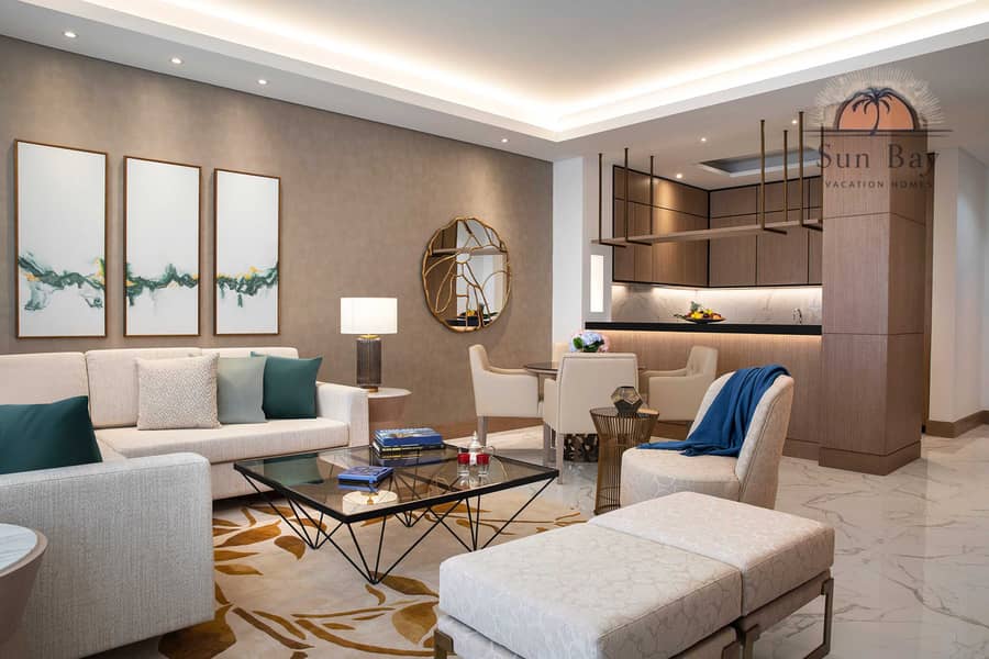 2 One Bedroom Suite - Living and Dining Area. jpg