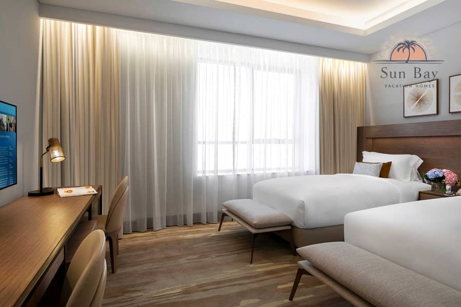 15 Three Bedroom Suite - Bedroom 2. jpg