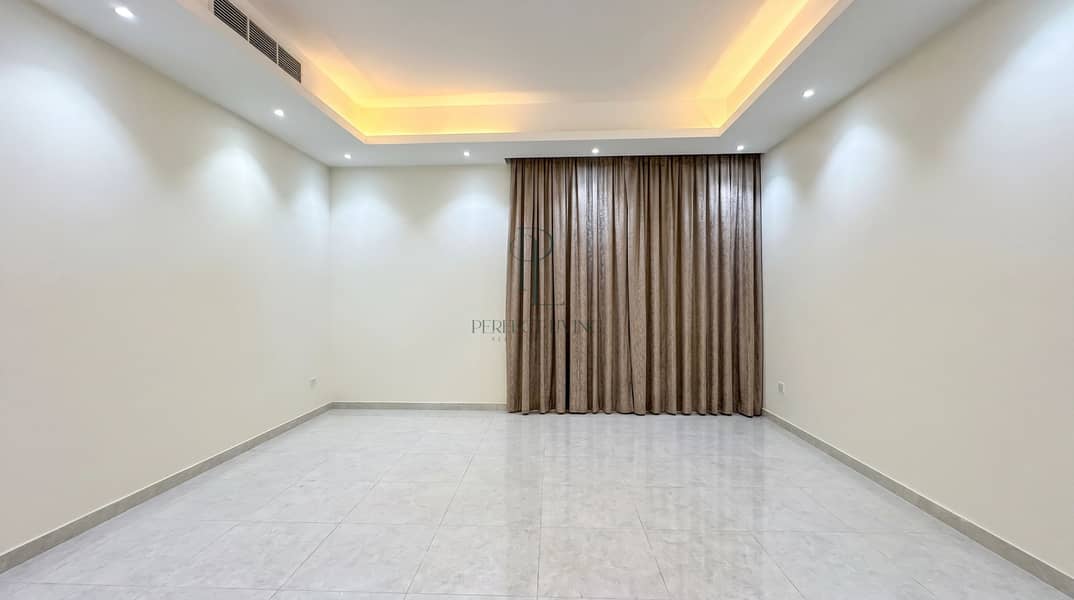 4 bedroom_brown_curtains_empty_polished. jpg