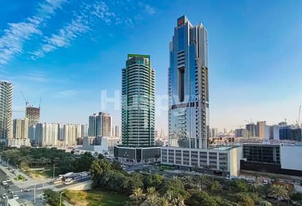 2 Bedroom Flat for Rent in Jumeirah Village Circle (JVC), Dubai - Large Layout | Full Park View | Fitted Kitchen