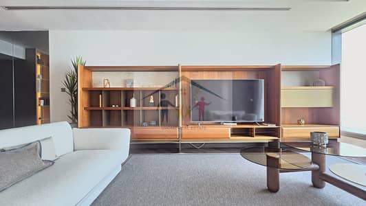 2 Camere Appartamento in affitto a Al Reem Island, Abu Dhabi - sun-02-living-room-media-wall. jpg