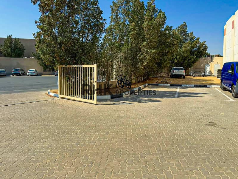 7 Gated parking area outside an industrial warehouse in DIP 2, Dubai