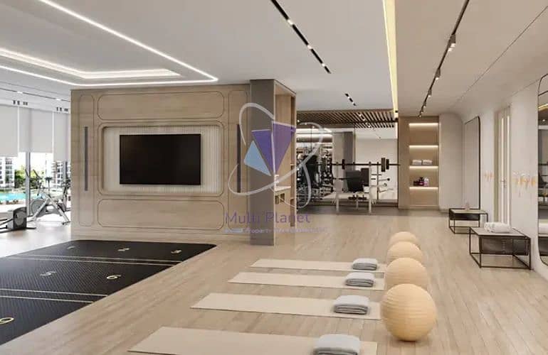11 Fully-Equipped-Gym-Yoga-Studio-–-Azizi-Milan-Tower-Dubai-r4ijnryir3e3csq3ckxue3c87tcpm1zj1osn52agi0. webp