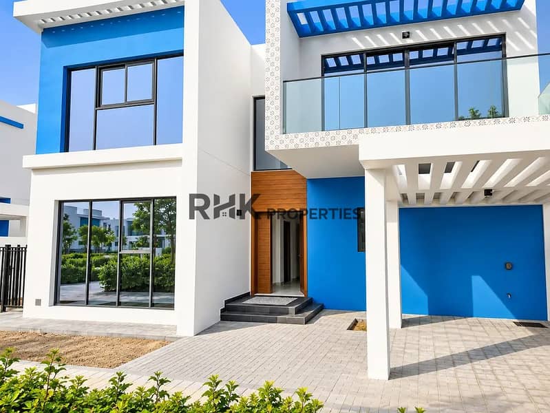 11 Modern 4-bedroom villa for sale in Dubai with blue accent facade, private garage, glass balcony, and wooden front door