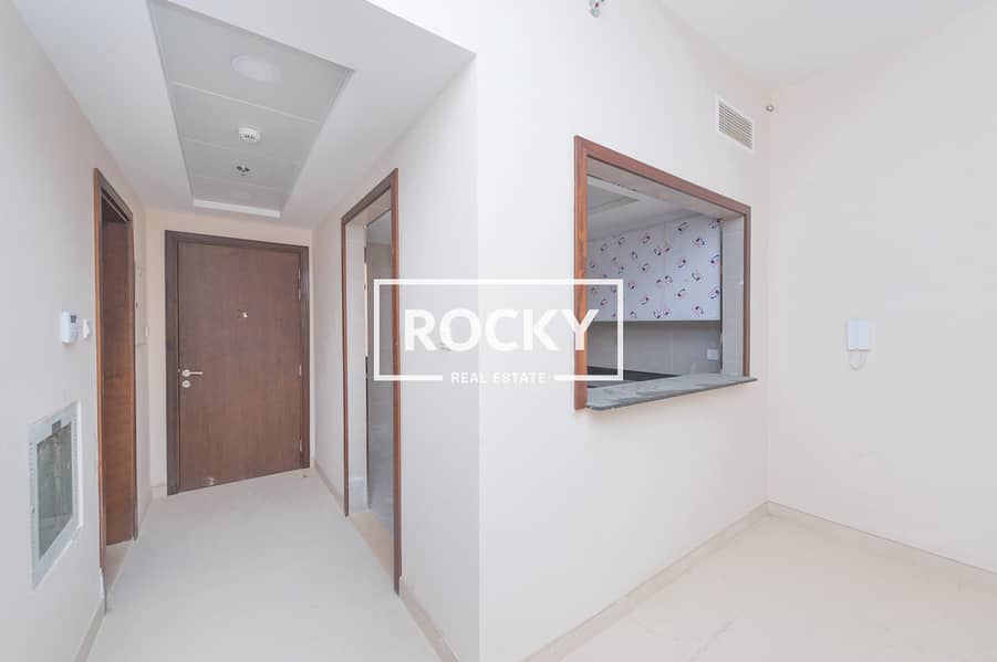 5 Rocky Real Estate - International City - Amna Res. - Apartment (4 of 17). JPG