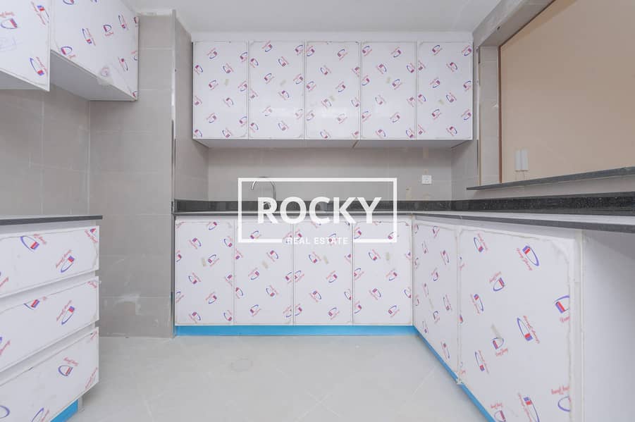 8 Rocky Real Estate - International City - Amna Res. - Apartment (5 of 17). JPG