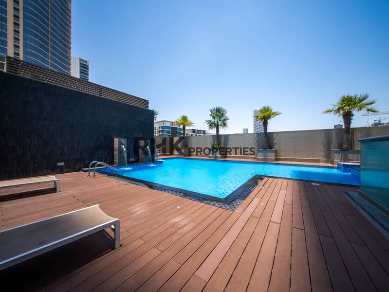 10 Outdoor swimming pool with sun deck, lounge area and resort-style residential amenities