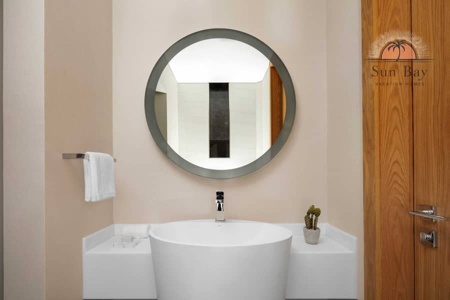 6 Cloud Living One Bedroom Duplex Guest Bathroom. jpg