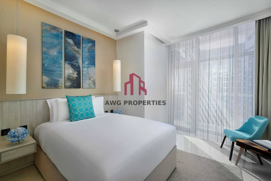 2 NH_Collection_Dubai_The_Palm_Superior_Studio_Bedroom_3 res. jpeg