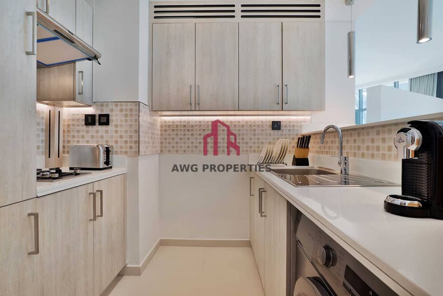 5 NH_Collection_Dubai_The_Palm_Superior_Studio_Kitchen res. jpeg