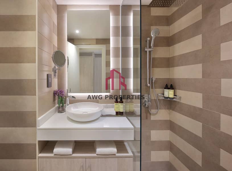 7 NH_Collection_Dubai_The_Palm_Studio_Bathroom. jpeg
