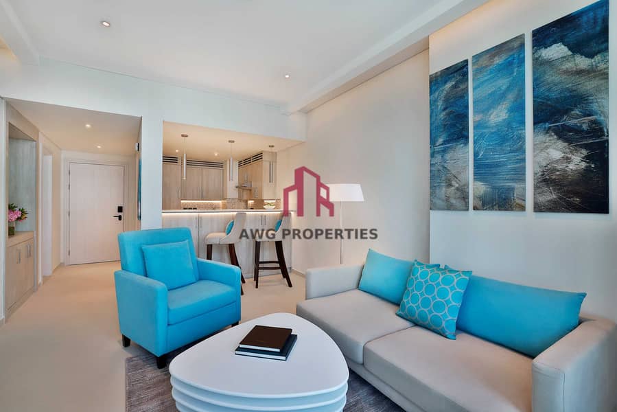 2 NH_Collection_Dubai_The_Palm_Superior_One_Bedroom_Sea_View_Apartment_Living_Area_2. jpg